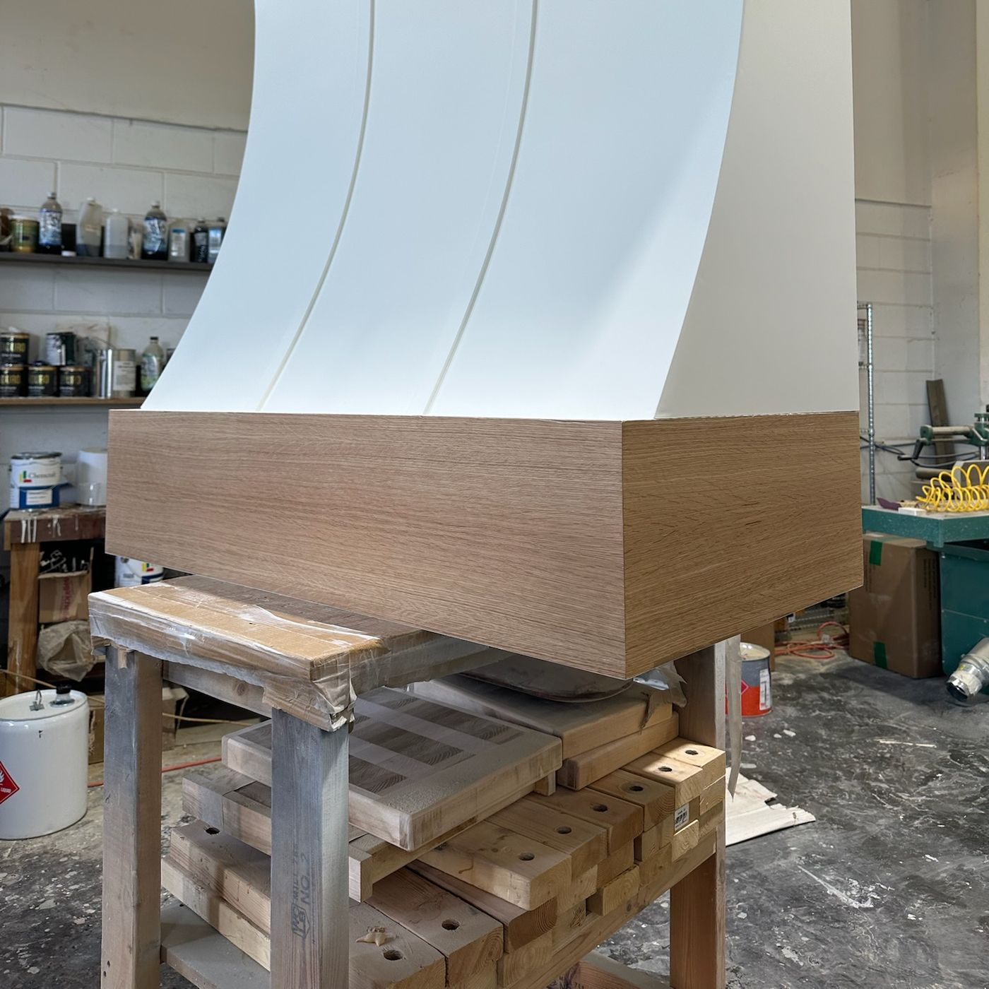 Custom range hood under construction at the Mastery Cabinetry shop in Orlando