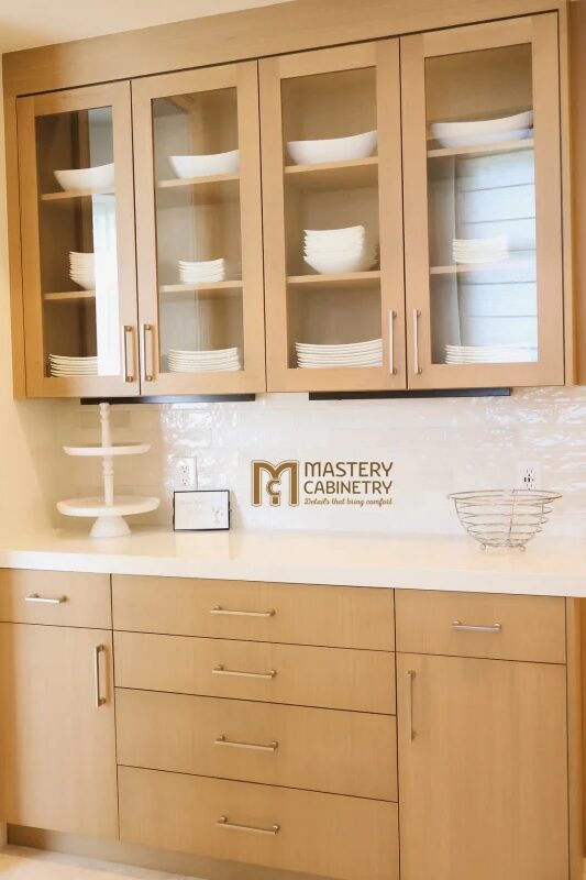 Glass front display cabinetry by Mastery Cabinetry Orlando